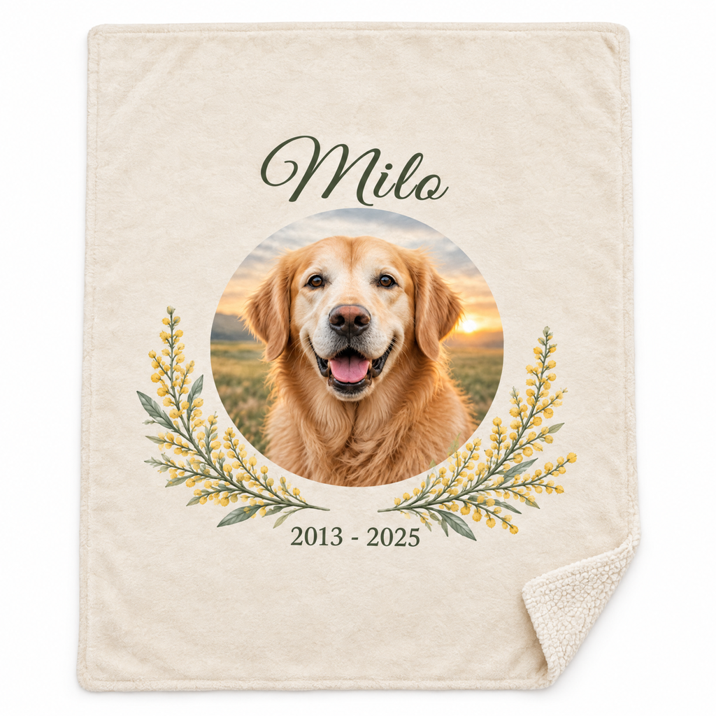 Personalised pet memorial blanket laid flat on white, printed edge to edge in cream with a golden retriever photo, the name Milo, golden wattle and the years 2013 to 2025, corner turned to show the sherpa back